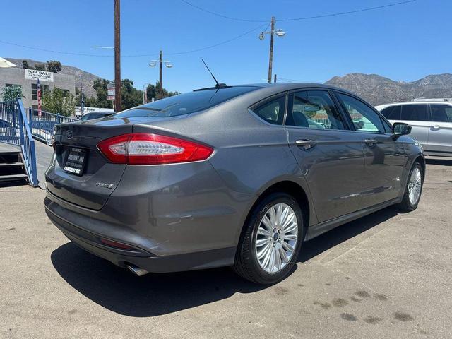 Photo of 2014 Sterling Gray Metallic Ford Fusion Hybrid