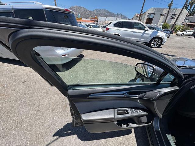 Photo of 2014 Sterling Gray Metallic Ford Fusion Hybrid