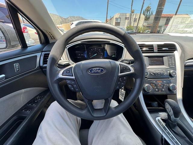 Photo of 2014 Sterling Gray Metallic Ford Fusion Hybrid