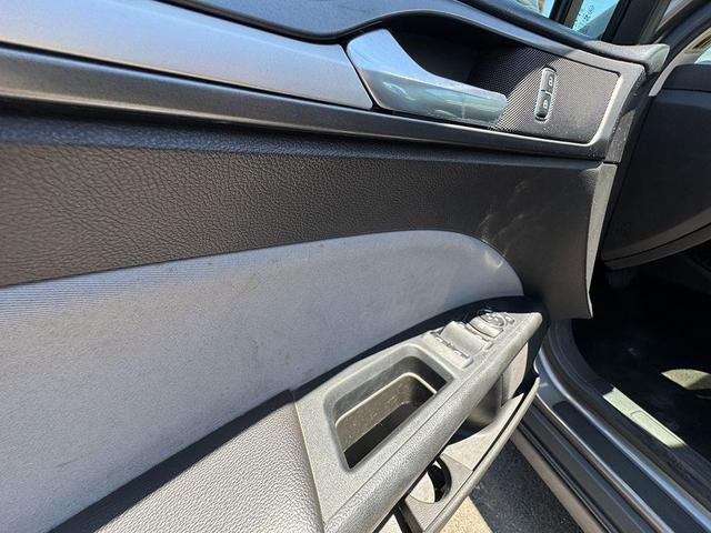 Photo of 2014 Sterling Gray Metallic Ford Fusion Hybrid