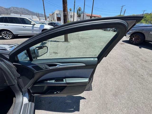 Photo of 2014 Sterling Gray Metallic Ford Fusion Hybrid