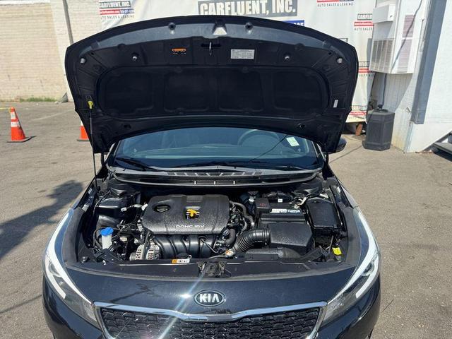 Photo of 2018 Aurora Black Kia Forte
