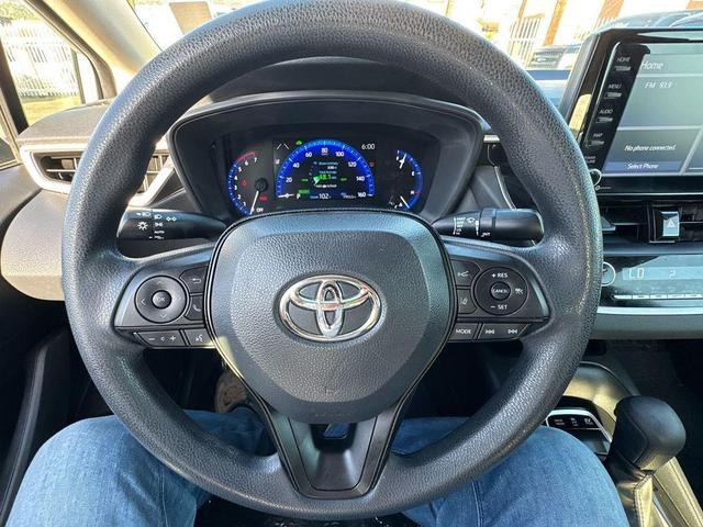 Photo of 2022 White Toyota Corolla Hybrid