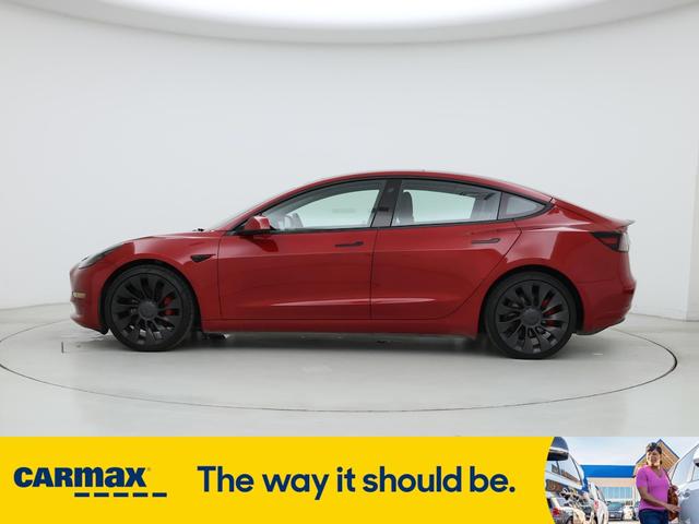 Photo of 2022 Red Tesla Model 3