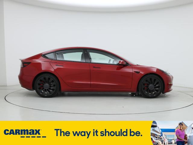 Photo of 2022 Red Tesla Model 3