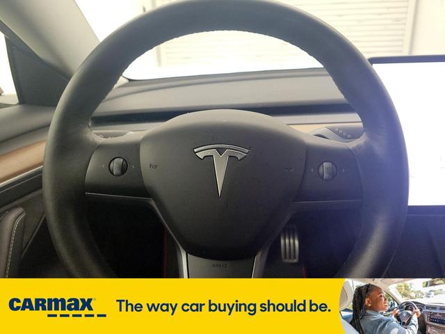 Photo of 2022 Red Tesla Model 3