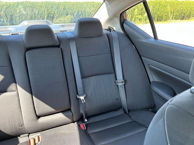 Photo of 2024 Garnet Pearl Metallic Nissan Altima