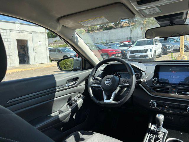 Photo of 2024 Garnet Pearl Metallic Nissan Altima