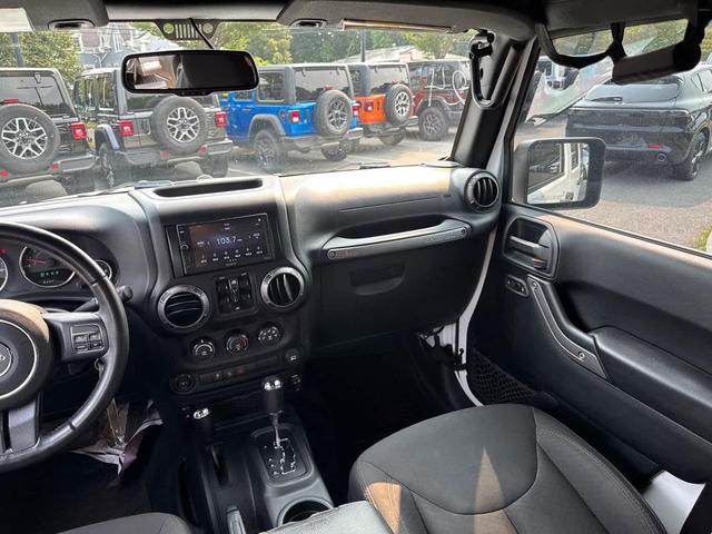 Photo of 2017 Bright White Clearcoat Jeep Wrangler Unlimited
