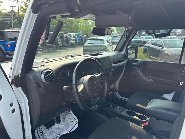 Photo of 2017 Bright White Clearcoat Jeep Wrangler Unlimited