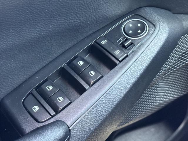 Photo of 2023 Starbright Yellow/Black Roof Kia Seltos