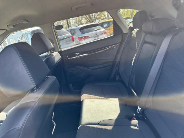 Photo of 2023 Starbright Yellow/Black Roof Kia Seltos