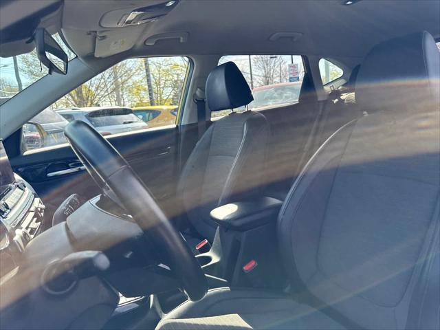 Photo of 2023 Starbright Yellow/Black Roof Kia Seltos