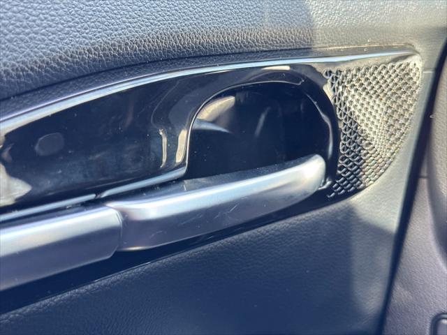 Photo of 2023 Starbright Yellow/Black Roof Kia Seltos