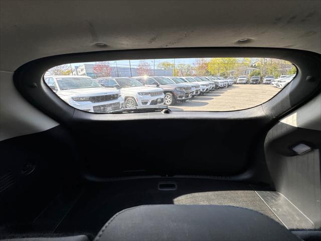 Photo of 2023 Starbright Yellow/Black Roof Kia Seltos