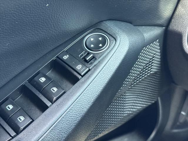 Photo of 2023 Starbright Yellow/Black Roof Kia Seltos