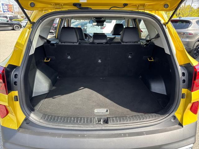 Photo of 2023 Starbright Yellow/Black Roof Kia Seltos