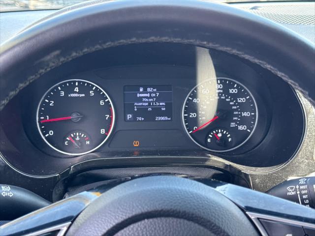 Photo of 2023 Starbright Yellow/Black Roof Kia Seltos
