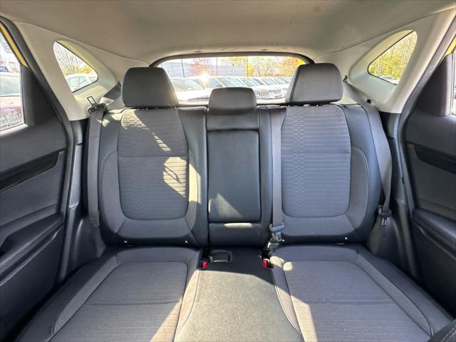 Photo of 2023 Starbright Yellow/Black Roof Kia Seltos