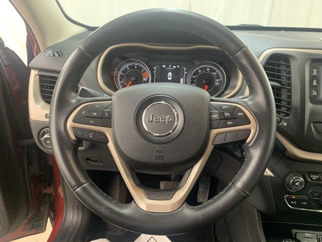 Photo of 2016 Deep Cherry Red Crystal Pearlcoat Jeep Cherokee