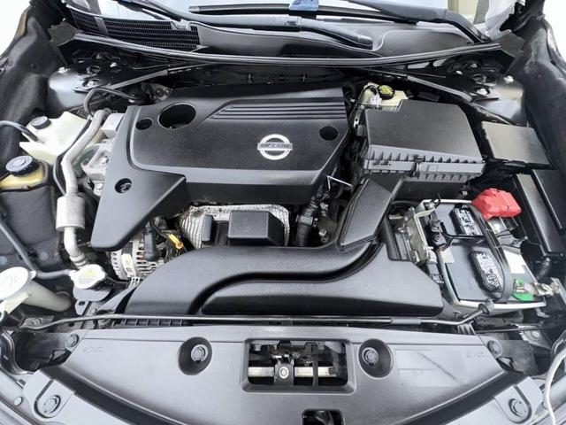 Photo of 2015 Super Black Nissan Altima