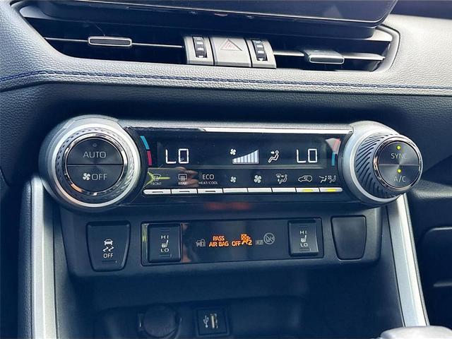 Photo of 2023 Wind Chill Pearl / Midnight Black Metallic Toyota RAV4 Hybrid