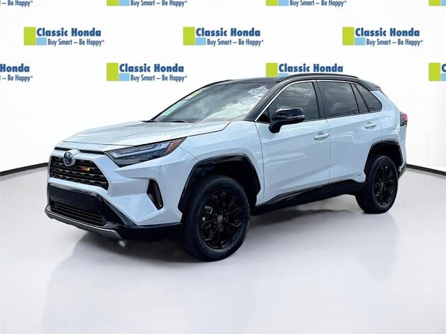 Photo of 2023 Wind Chill Pearl / Midnight Black Metallic Toyota RAV4 Hybrid
