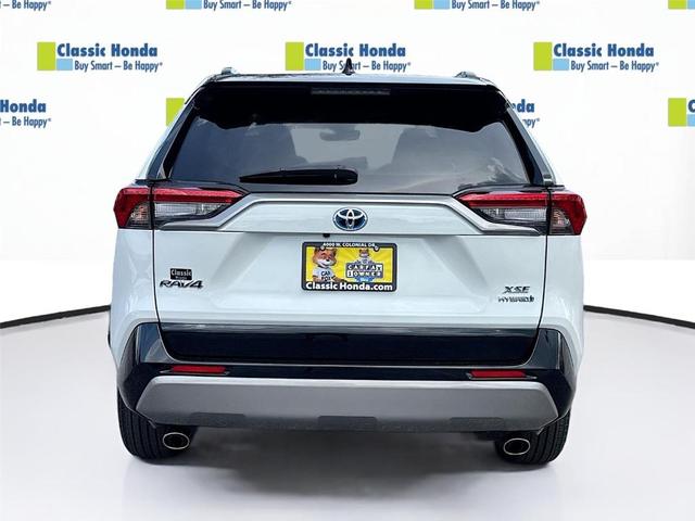 Photo of 2023 Wind Chill Pearl / Midnight Black Metallic Toyota RAV4 Hybrid
