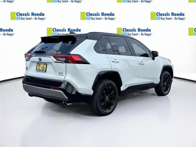 Photo of 2023 Wind Chill Pearl / Midnight Black Metallic Toyota RAV4 Hybrid