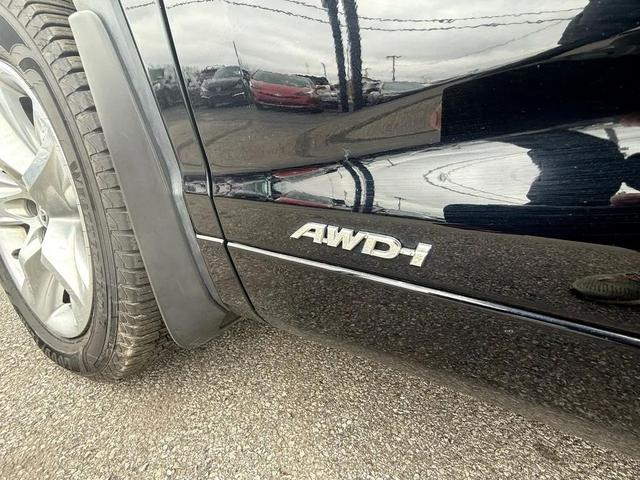 Photo of 2016 Midnight Black Metallic Toyota Highlander Hybrid