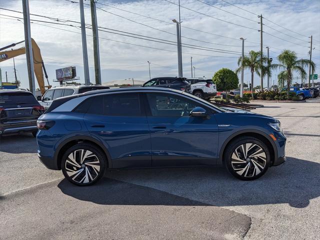 Photo of 2025 Mountain Lake Blue Metallic/Black Roof Volkswagen ID.4