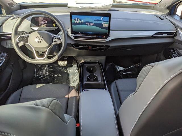 Photo of 2025 Mountain Lake Blue Metallic/Black Roof Volkswagen ID.4