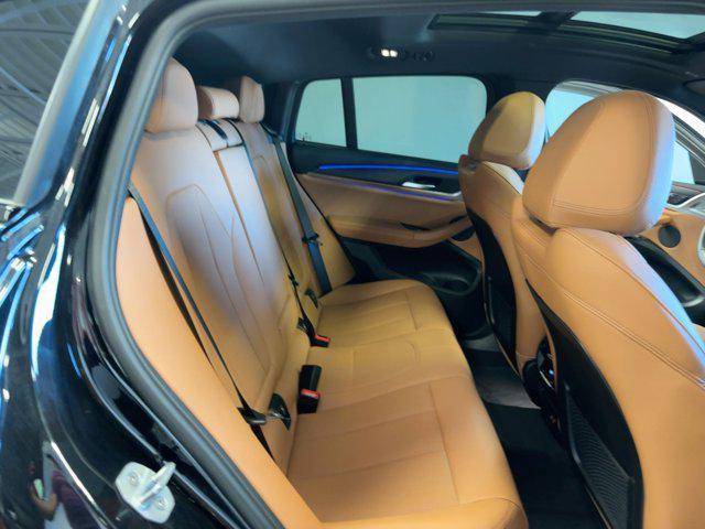 Photo of 2025 Black Sapphire Metallic BMW X4