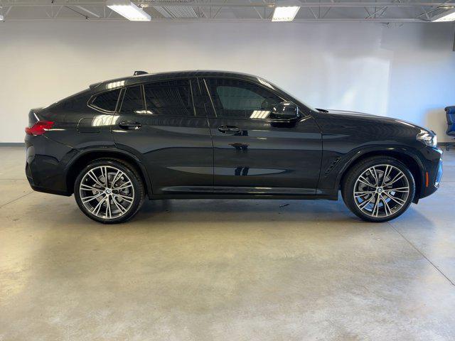 Photo of 2025 Black Sapphire Metallic BMW X4