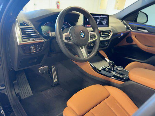 Photo of 2025 Black Sapphire Metallic BMW X4