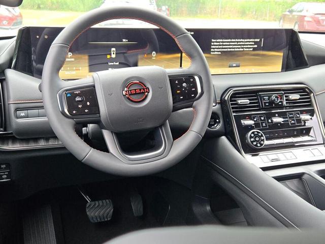 Photo of 2025 Aspen White Tricoat/Super Black Nissan Armada