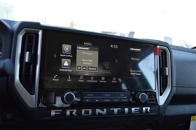 Photo of 2025 Glacier White Nissan Frontier