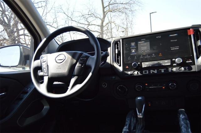 Photo of 2025 Glacier White Nissan Frontier