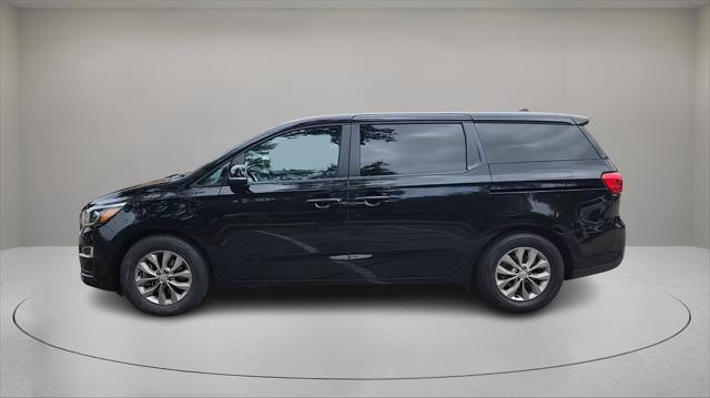 Photo of 2020 Aurora Black Kia Sedona