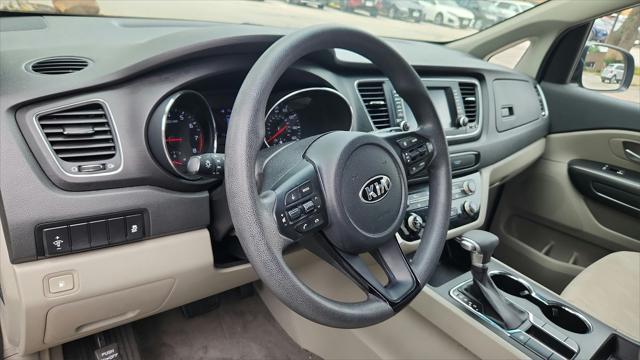 Photo of 2020 Aurora Black Kia Sedona