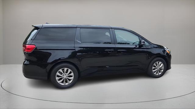 Photo of 2020 Aurora Black Kia Sedona