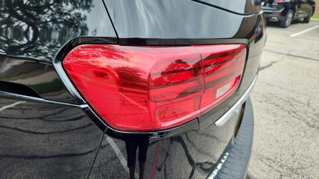 Photo of 2020 Aurora Black Kia Sedona