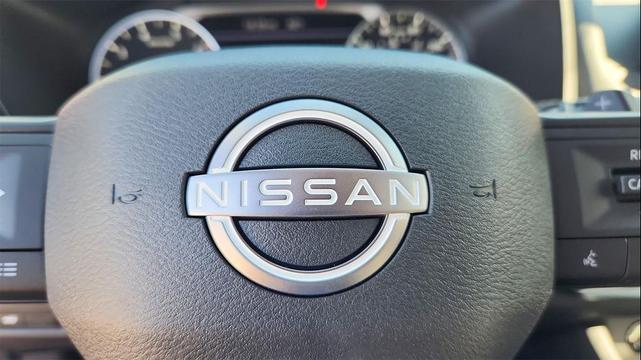 Photo of 2025 Scarlet Ember Tintcoat Nissan Rogue