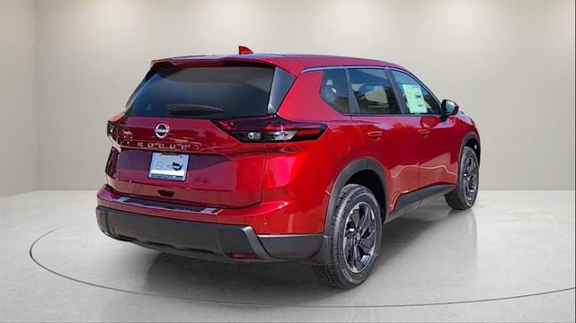 Photo of 2025 Scarlet Ember Tintcoat Nissan Rogue