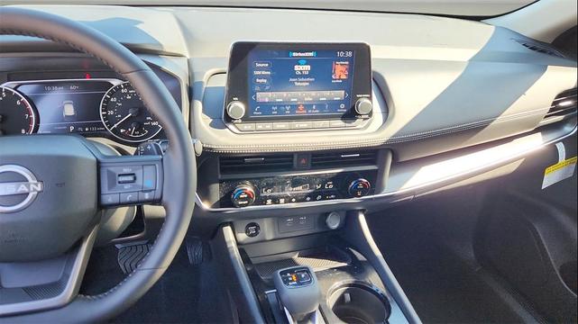 Photo of 2025 Scarlet Ember Tintcoat Nissan Rogue