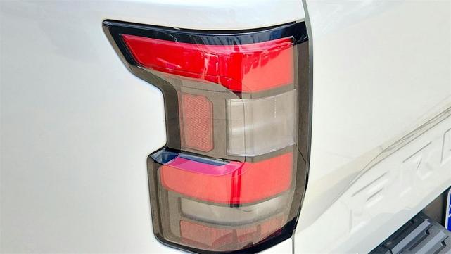 Photo of 2024 Glacier White Nissan Frontier