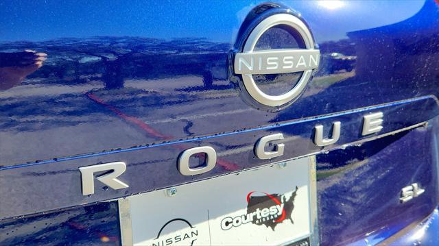 Photo of 2025 Deep Ocean Blue Pearl/Super Black Nissan Rogue