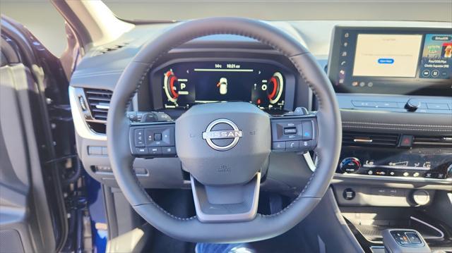 Photo of 2025 Deep Ocean Blue Pearl/Super Black Nissan Rogue