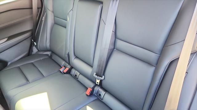Photo of 2025 Deep Ocean Blue Pearl/Super Black Nissan Rogue