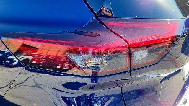 Photo of 2025 Deep Ocean Blue Pearl/Super Black Nissan Rogue